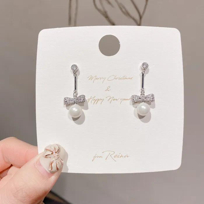 Earrings Refined by AnnaKaci Pearl and Bow Silver Dangle Earring